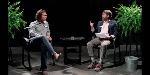 Zach Galifianakis interviews Matthew McConaughey in a scene from “Between Two Ferns: The Movie.” Both actors play themselves in the film. Courtesy of IMDB